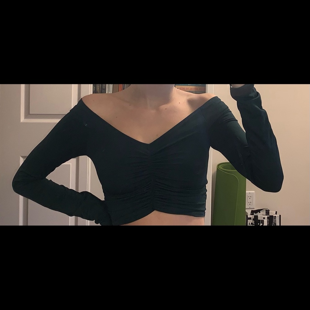 Super cute and flattering ruched top in a forest green colour shown in third pic